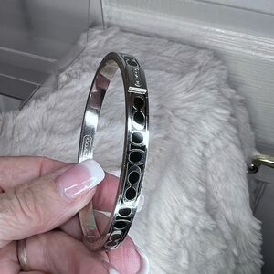 Coach Silver-Tone Bangle with Black Logo Accent